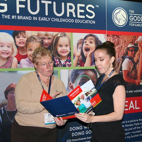 Photo of a tradeshow where potential franchisees learn how to open a Goddard School franchise.